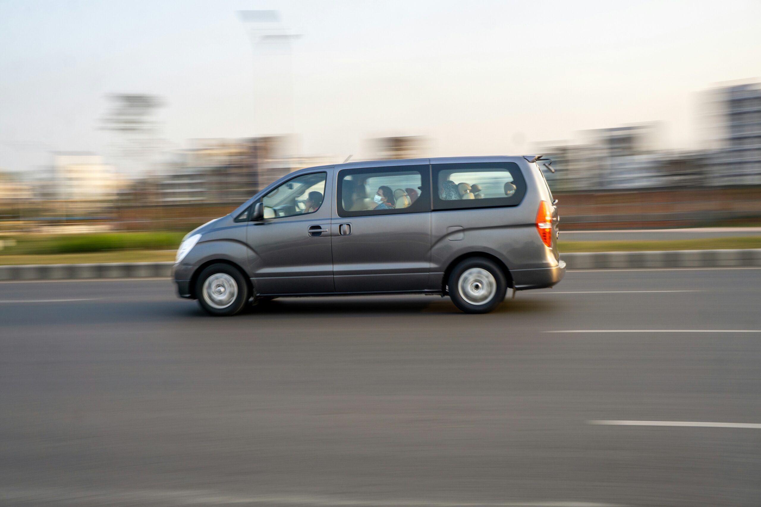 Passenger van similar to Maxx City on the road